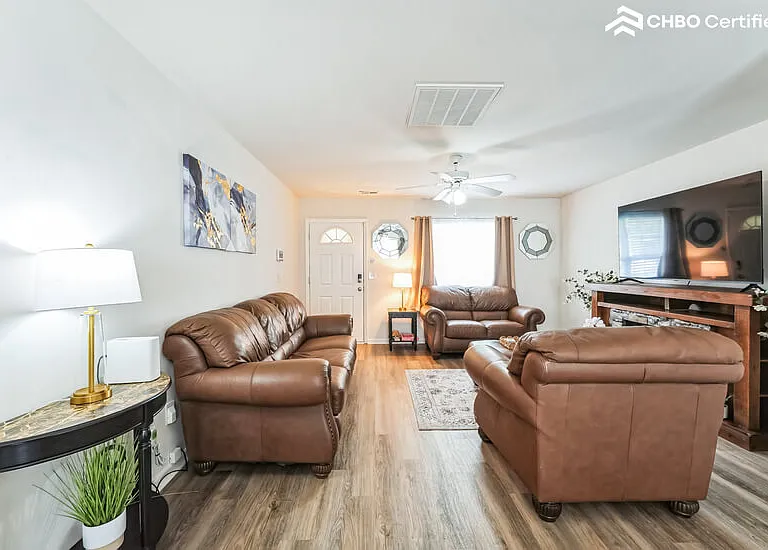 Comfy couch and 65 inch TV