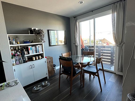 Dining room with a sliding door to the balcony.