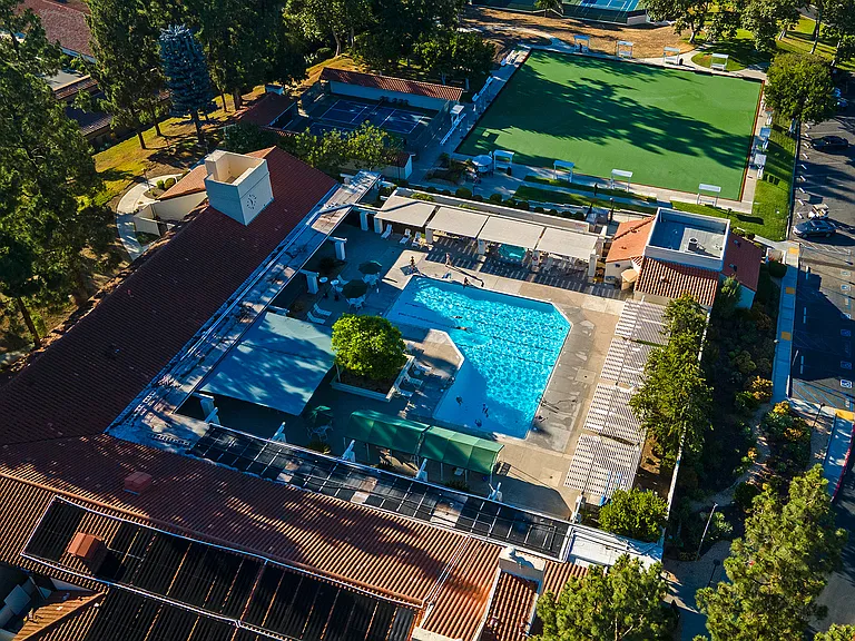 Residents enjoy access to a swimming pool and spa, pickleball and tennis courts, lawn bowling, fitness center, library, pottery studio, card rooms, numerous clubs and social activities, walking and hiking groups, and the nearby Oaks North Golf Course.