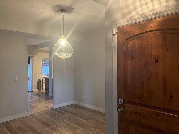 View to dining room and kitchen from front door