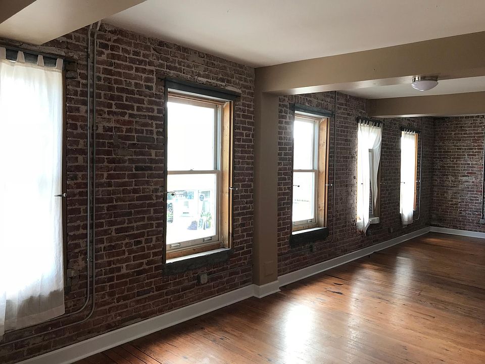 6 Huge Windows let in natural light and overlook the Histori