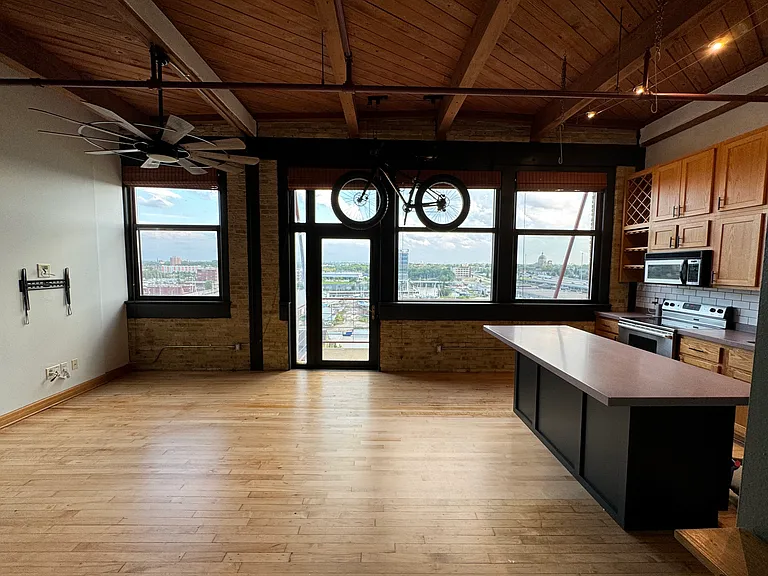 View from entrance is wow factor with wall of oversized windows and view, bike on built in hoist