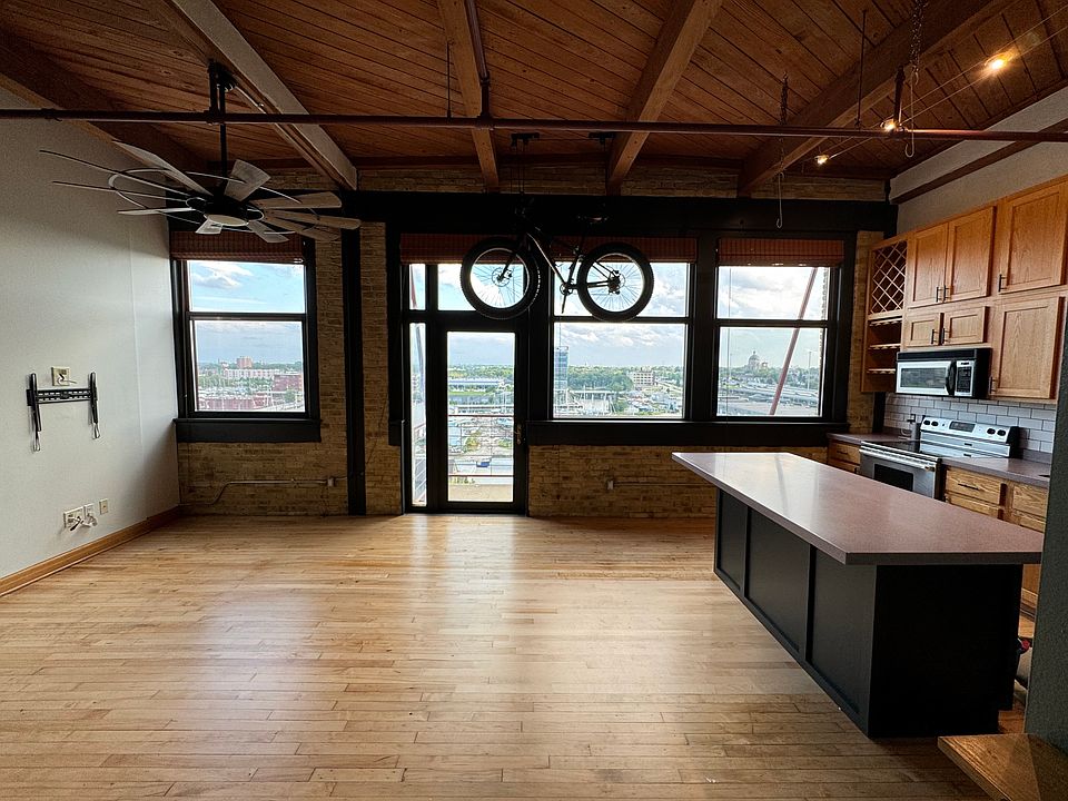 View from entrance is wow factor with wall of oversized windows and view, bike on built in hoist