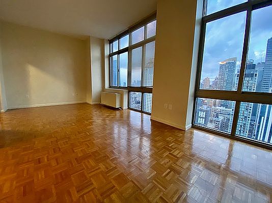 1st image of 100 W 26th St APT 21D