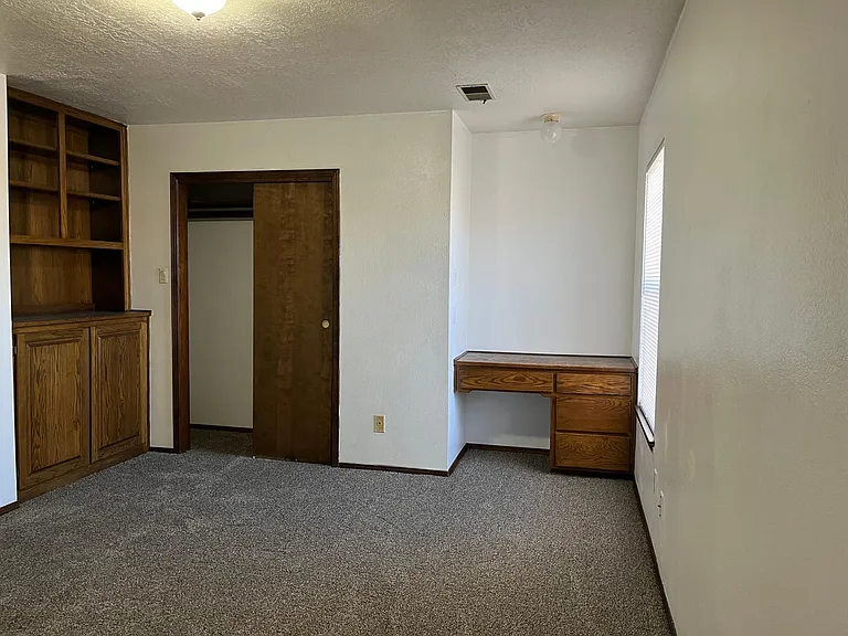 large bedrooms upstairs with nice built-ins