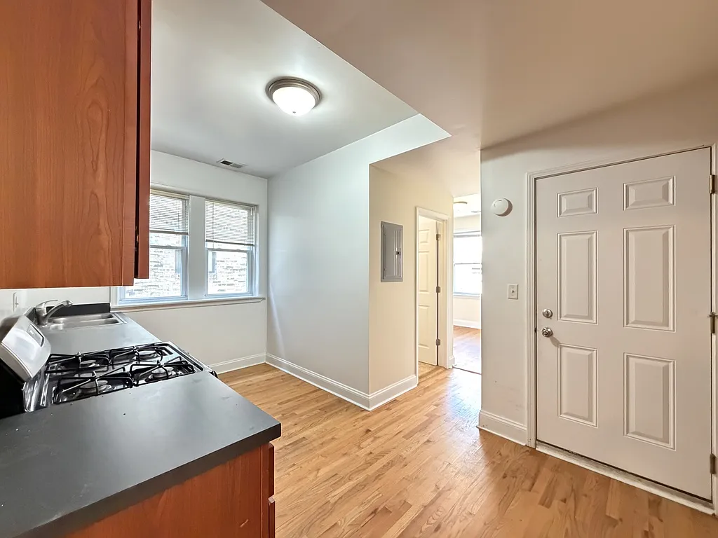 Appealing 3 Bed, 2 Bath at Parker + Kimball (Logan Square) — Photo 4