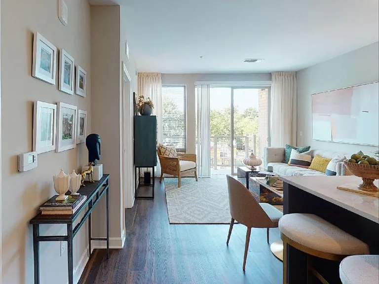 Homes feature large windows and abundant natural light