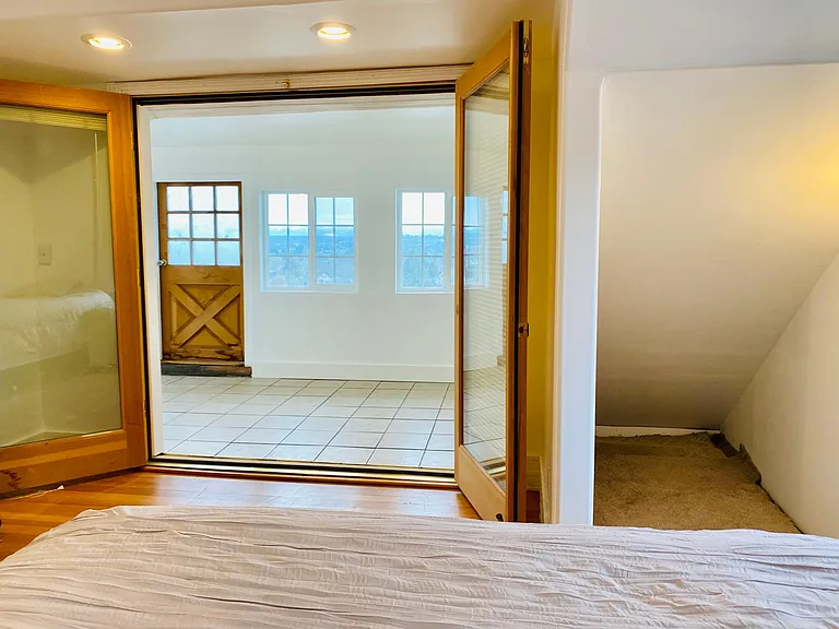 view of sleeping porch from bedroom