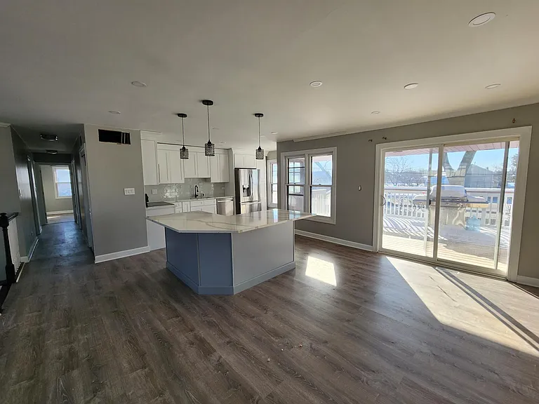 Second Floor: Kitchen and dining room area leading to rear porch on 2nd floor.