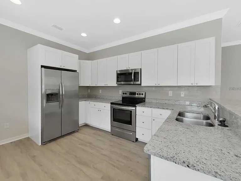 8303 King Blossom Ct — Photo 18