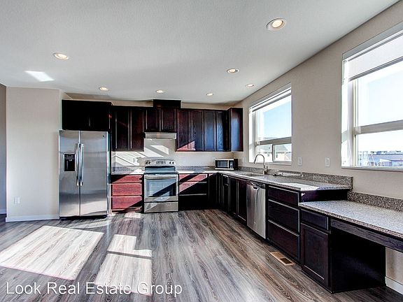 5th image of 8372 E 49th Pl