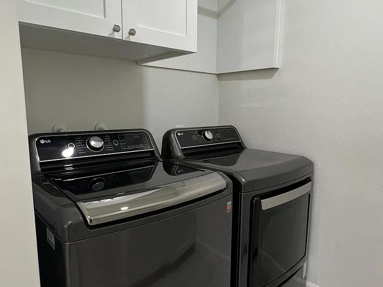 Laundry room / New Washer and Dryer with Barn Door