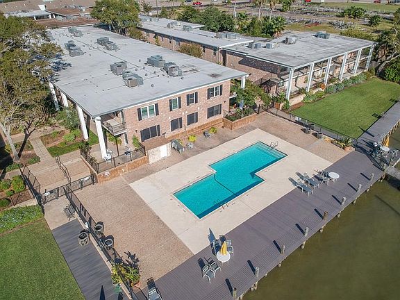 Spacious area right on Clear Lake with Salt Water pool and newer composite decking. Great place to entertain with family and friends and feel the breezes...