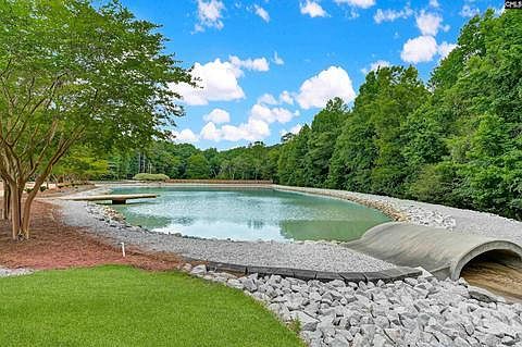Private pond with 400-meter walking track.