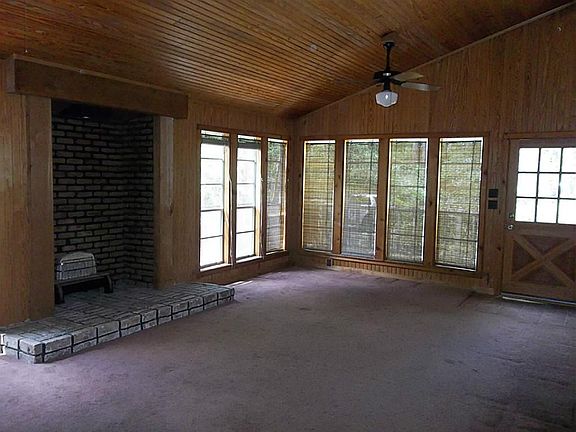 Den with lots of windows