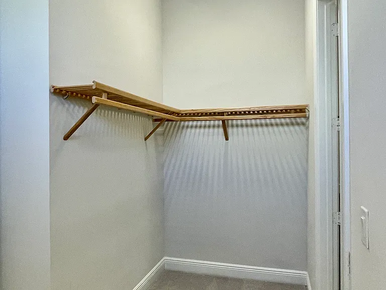 Additional space in extra large master closet.