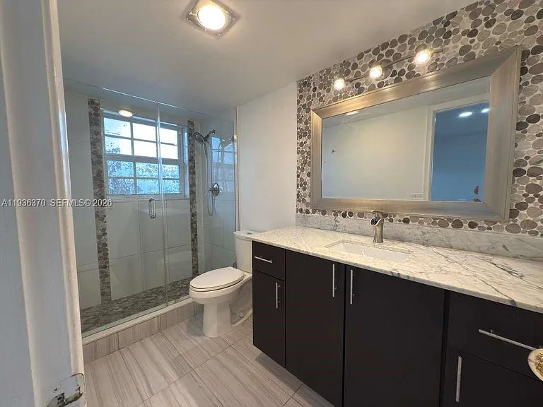 9001 Jacaranda Ln #107 — Photo 13