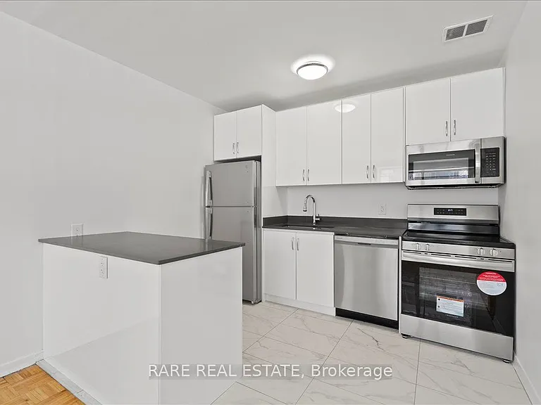 3111 Eglinton Ave E #102 — Photo 2