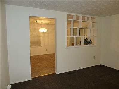 Living Room and Dining Room are separated by display wall