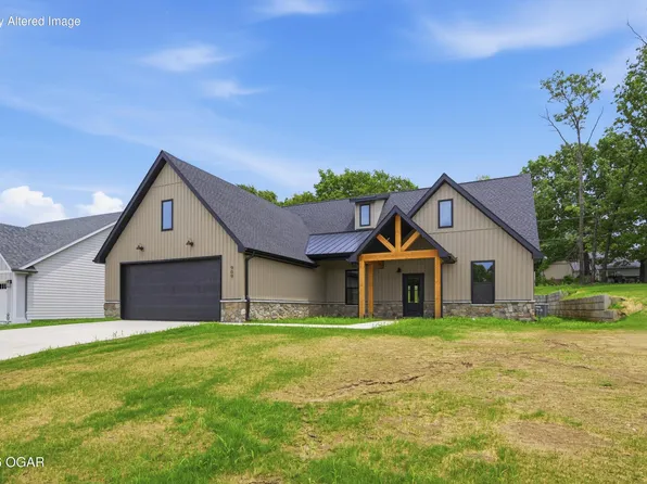 909 N Fountain St, Carterville, MO 64835