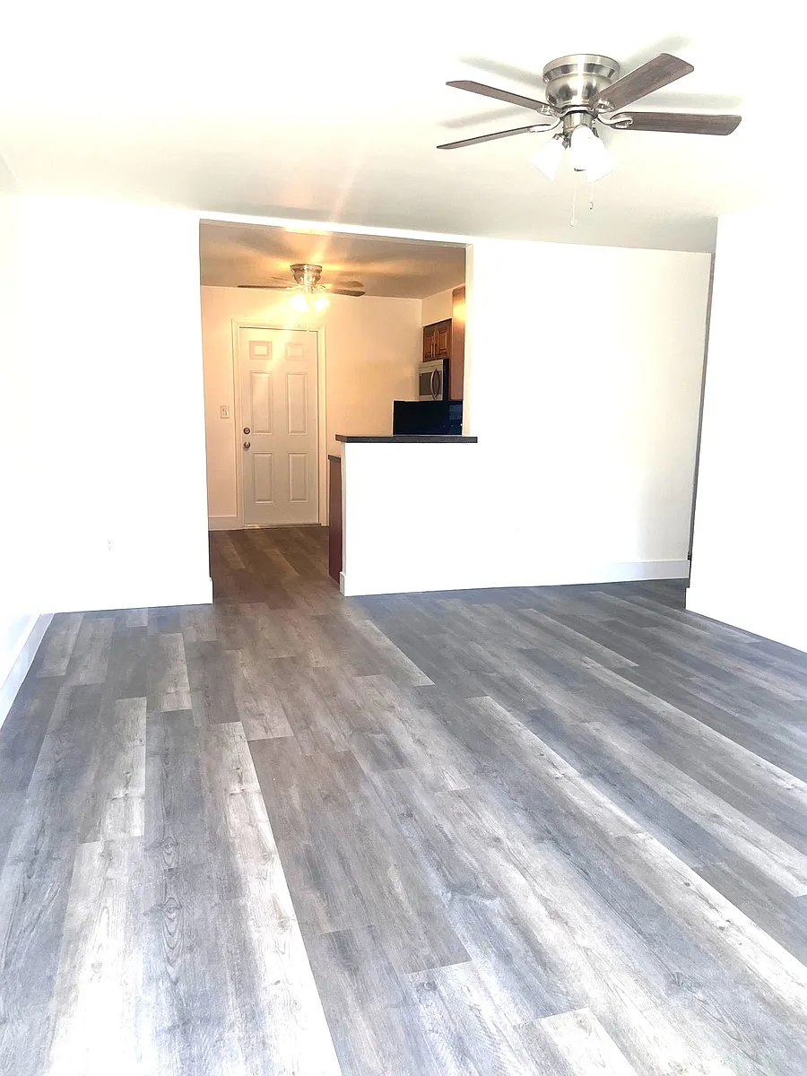 View into kitchen and rear door from entrance - 1283 NE 109th St #2