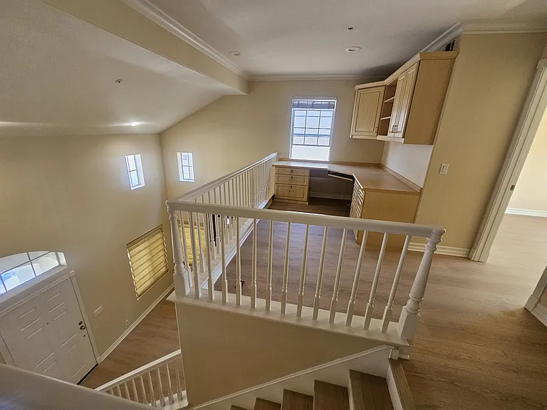 Loft with built in cabinets