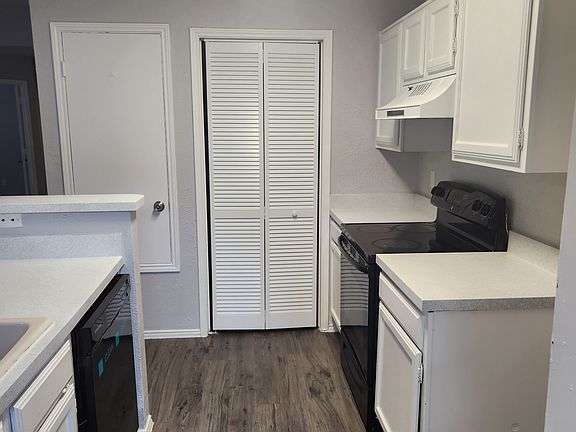 Kitchen facing the laundry room/ pantry
