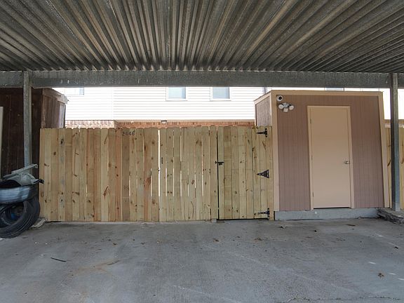 COVER PARKING WITH LOCK STORAGE
