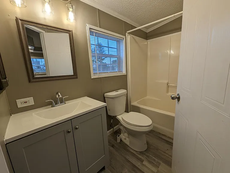 Common bathroom with full bath