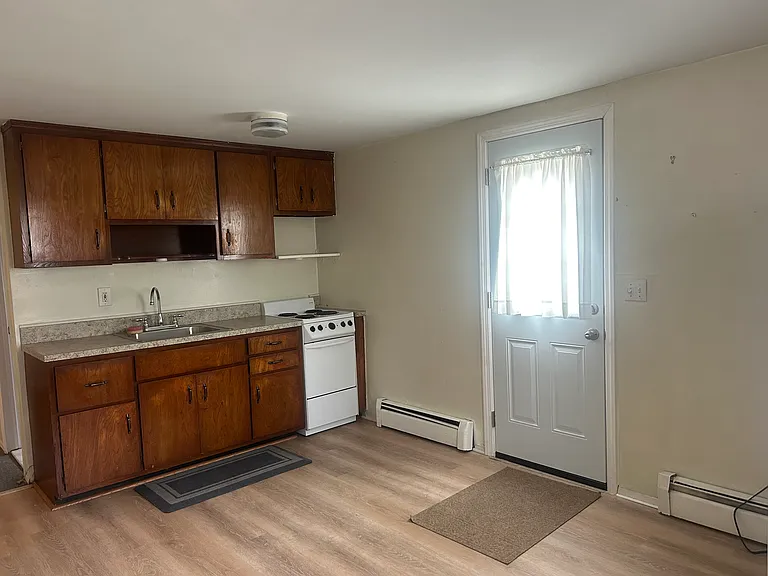 Over sized Eat In Kitchen with new counter top ,& Sink