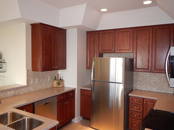 3rd image of 8855 Radcliff Dr NW Unit 20A