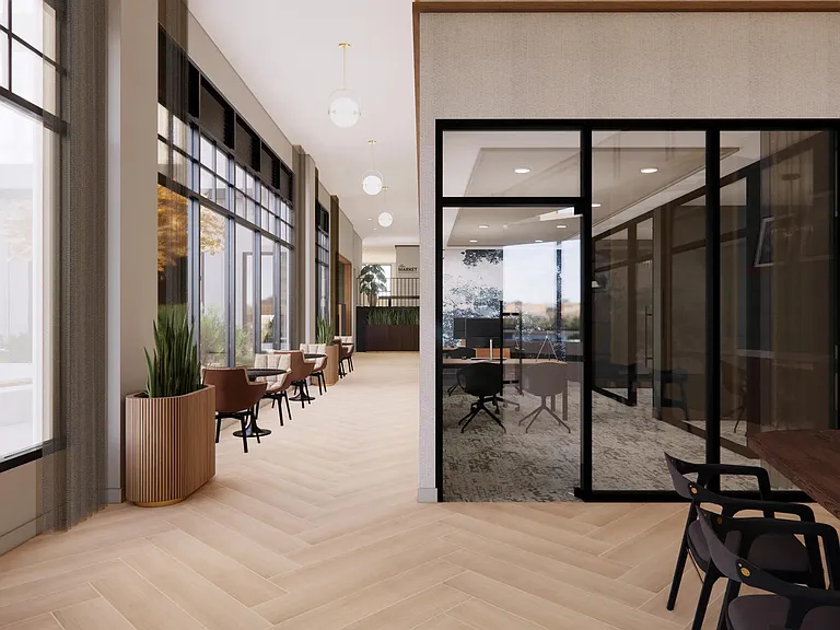 Brighlty lit resident lounge with ample social seating.