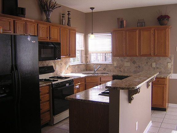 Granite counters and tiled floor