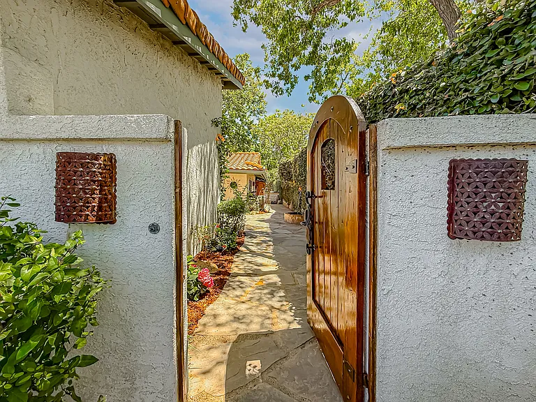 Front entrance leading to courtyard patio