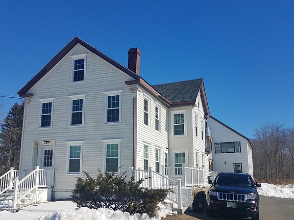 Curb view and front door to this unit.