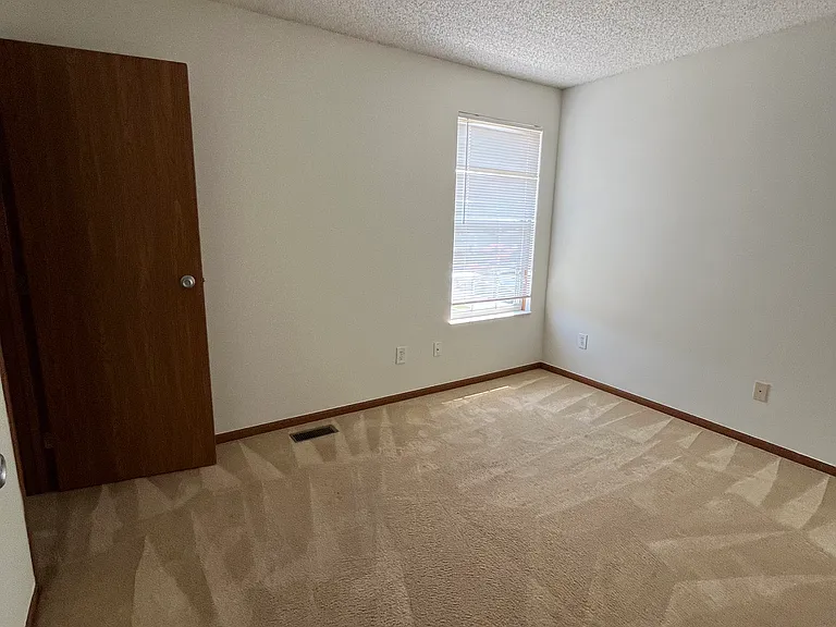 second bedroom with walk-in closet