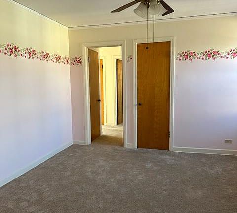 Bedroom with two clothes.