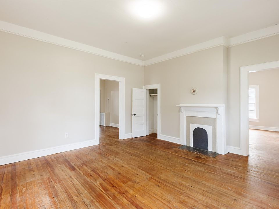 Main den area. Check out those hardwood floors!