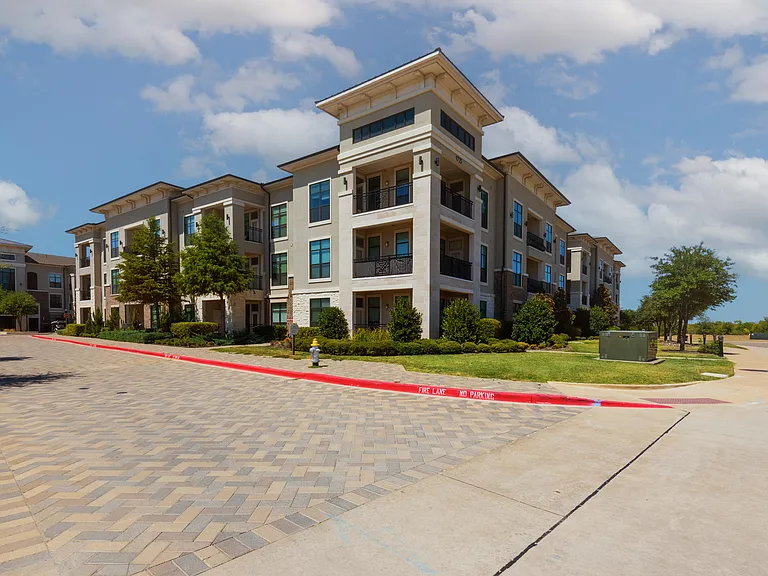 Elegant Exterior and Landscaping at The Hendry Apartments