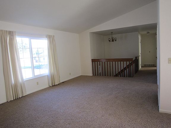 Living room with entry stairs