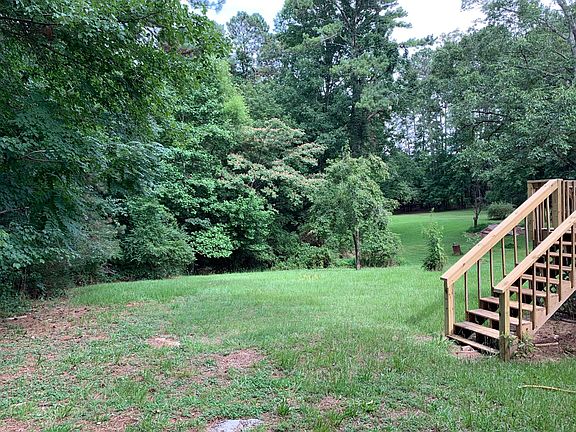 1 acre lot with fruit bearing pear tree
