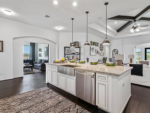 Kitchen with island and pendant lighting