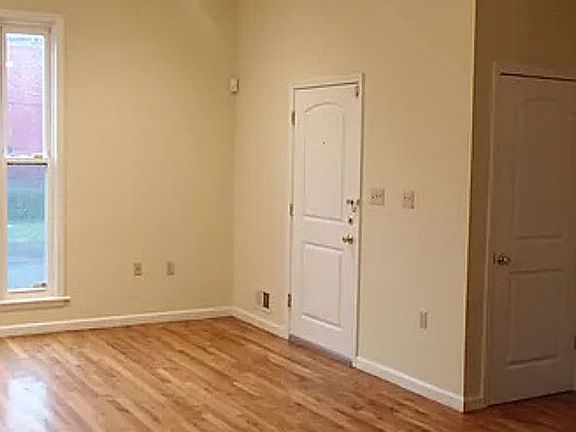 2nd image of 209-211 E 7th St