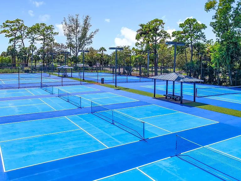 Take advantage of our expansive tennis court complex, designed for both casual play and competitive matches under Florida's beautiful blue skies.
