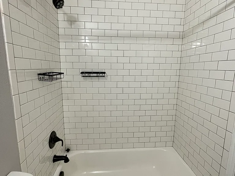 Bath/Shower in bathroom 1.