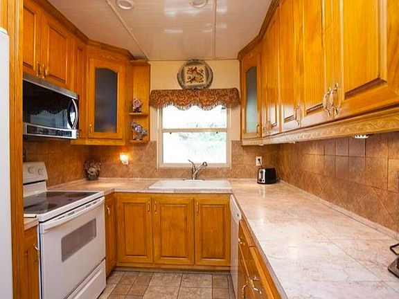 Kitchen with beautiful cabinets.