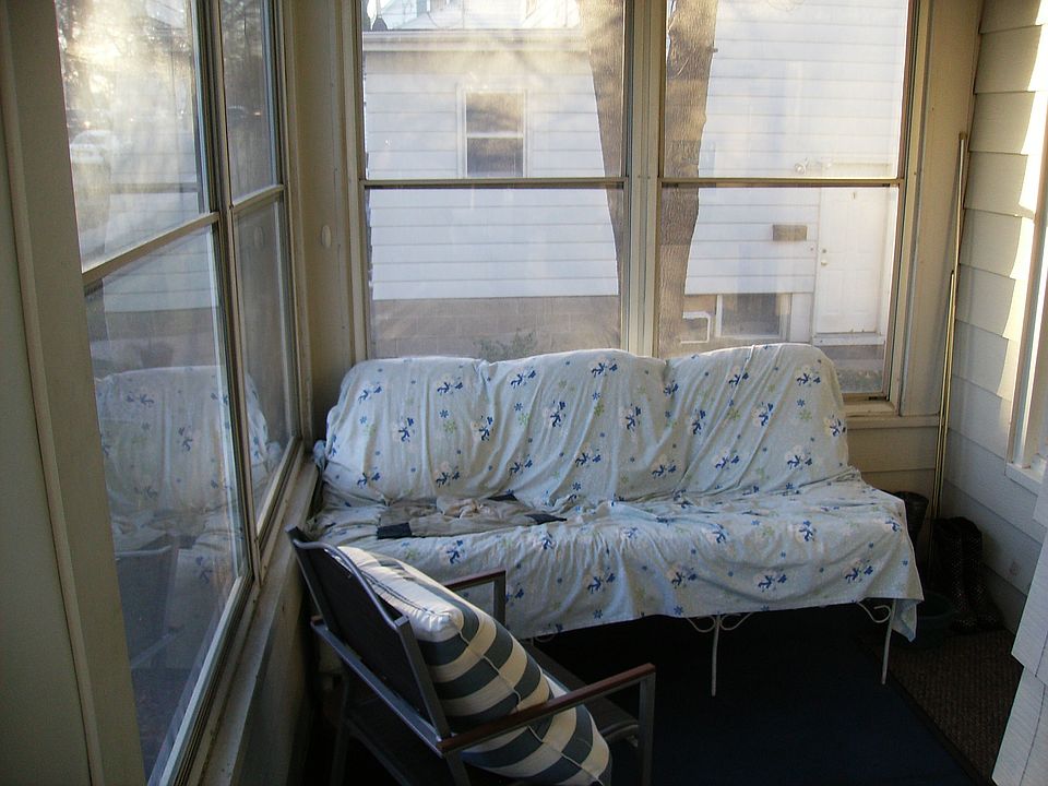 Enjoy a beautiful evening on the screened in front porch