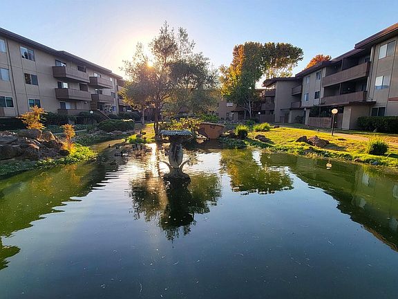 Duck pond with a lovely gazebo to stroll and start your day.