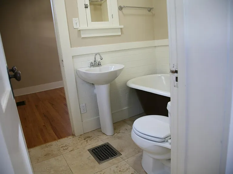 Main bathroom entered from the back bedroom.
