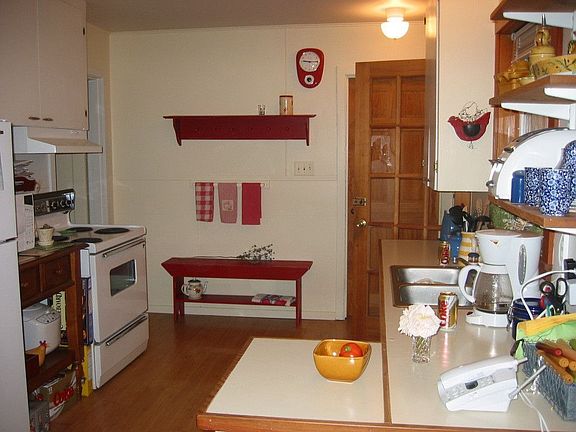 Partial view of kitchen from dining area